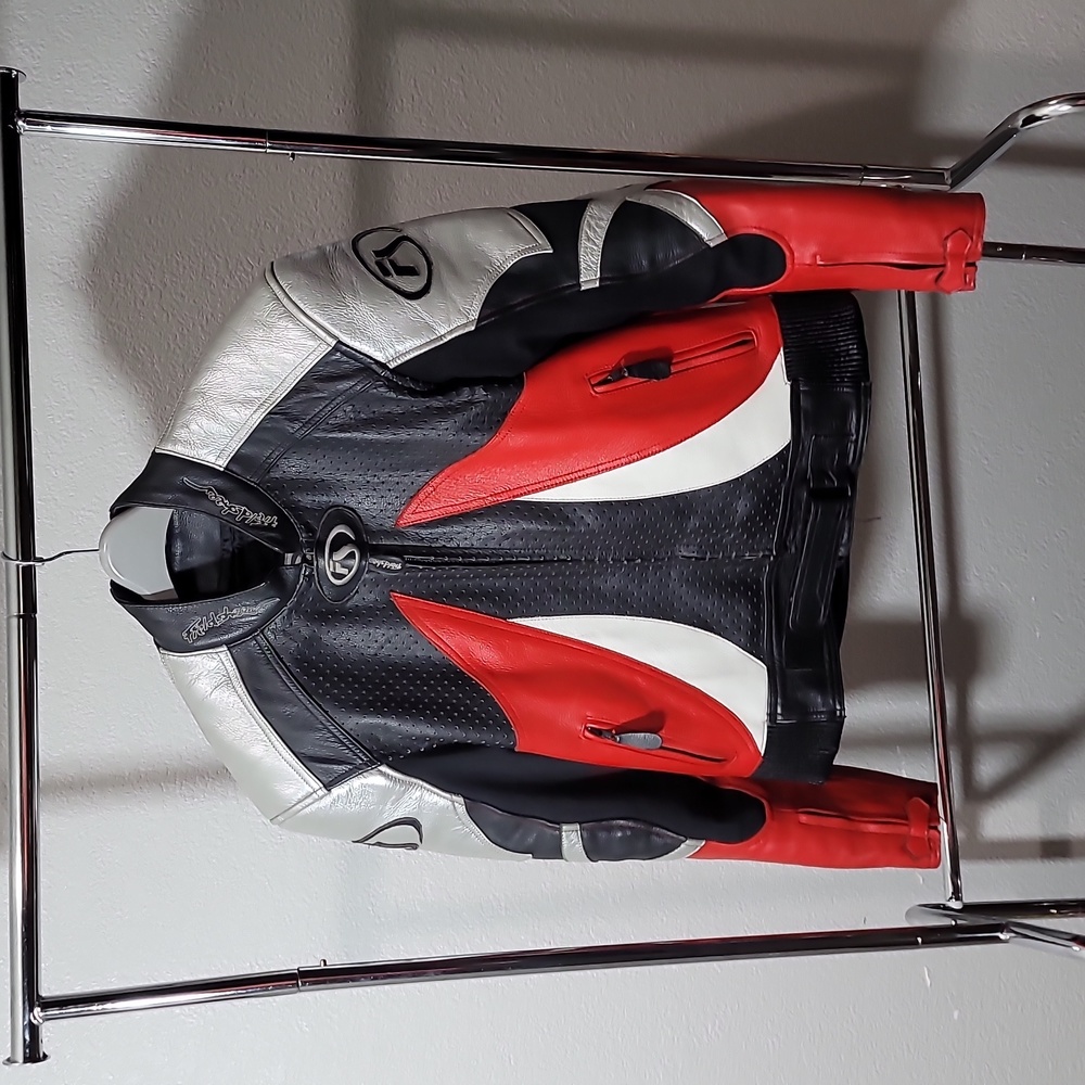 A FIELDSHEER heavy leather motorcycle jacket with full armor protection.